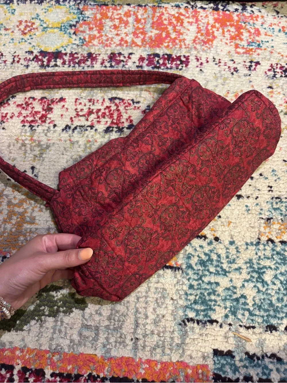 Quilted Red Pattern Shoulder Bag with Decorative Medallion